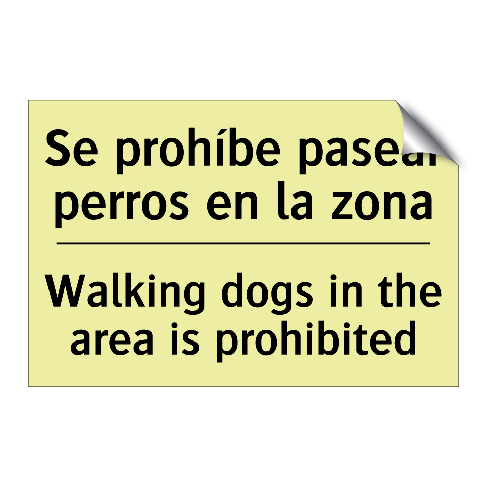 Se prohíbe pasear perros en la zona - Walking dogs in the area is prohibited