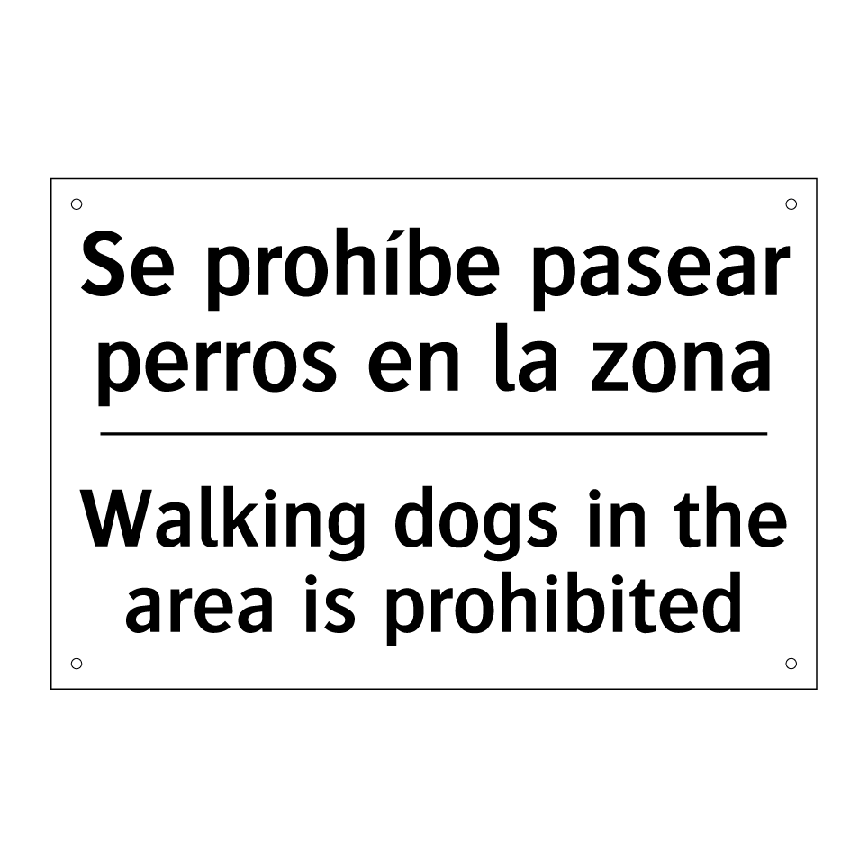 Se prohíbe pasear perros en la zona - Walking dogs in the area is prohibited