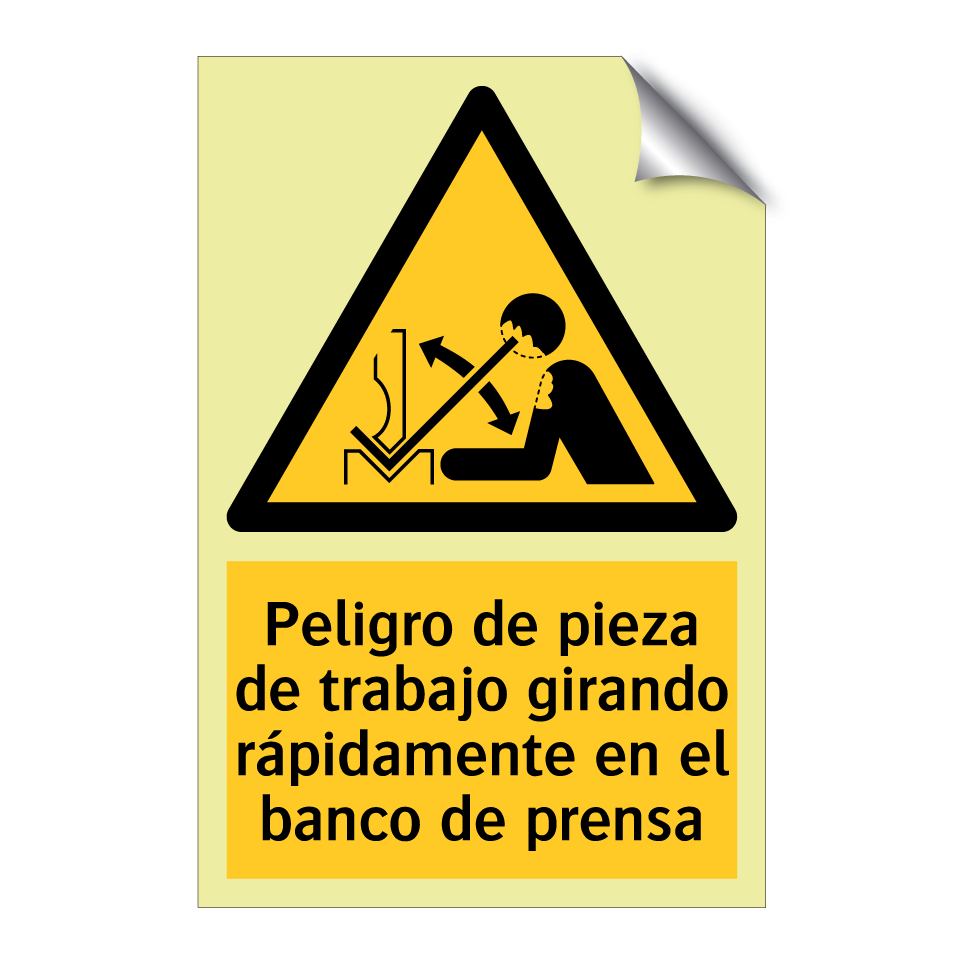 Peligro de pieza de trabajo girando rápidamente en el banco de prensa