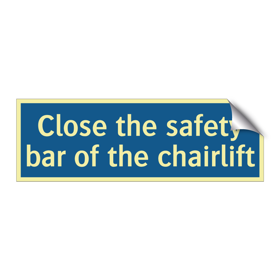 Close the safety bar of the chairlift