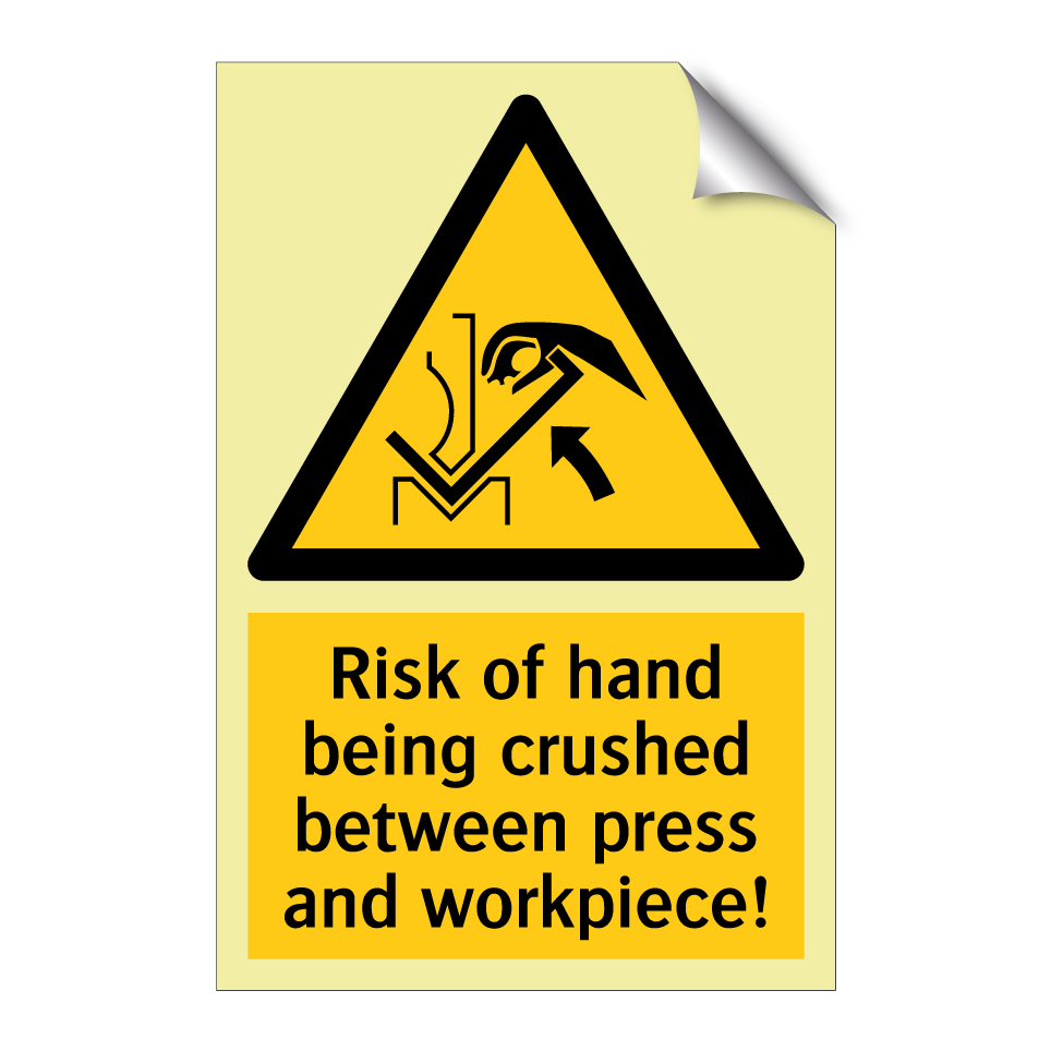 Risk of hand being crushed between press and workpiece!