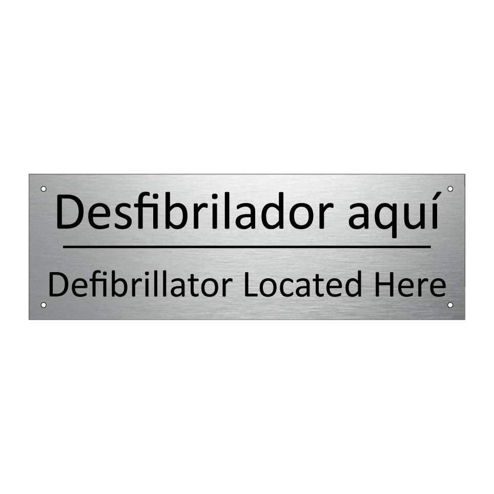 Desfibrilador aquí - Defibrillator Located Here