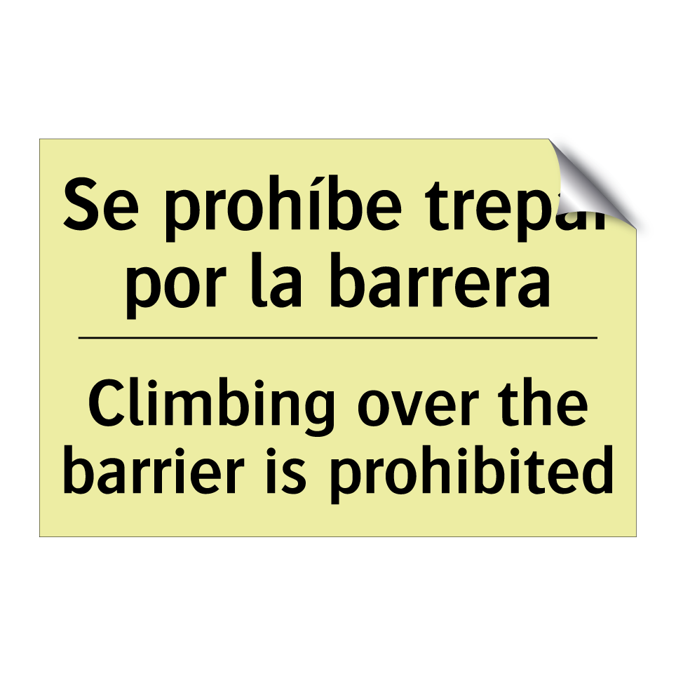 Se prohíbe trepar por la barrera - Climbing over the barrier is prohibited