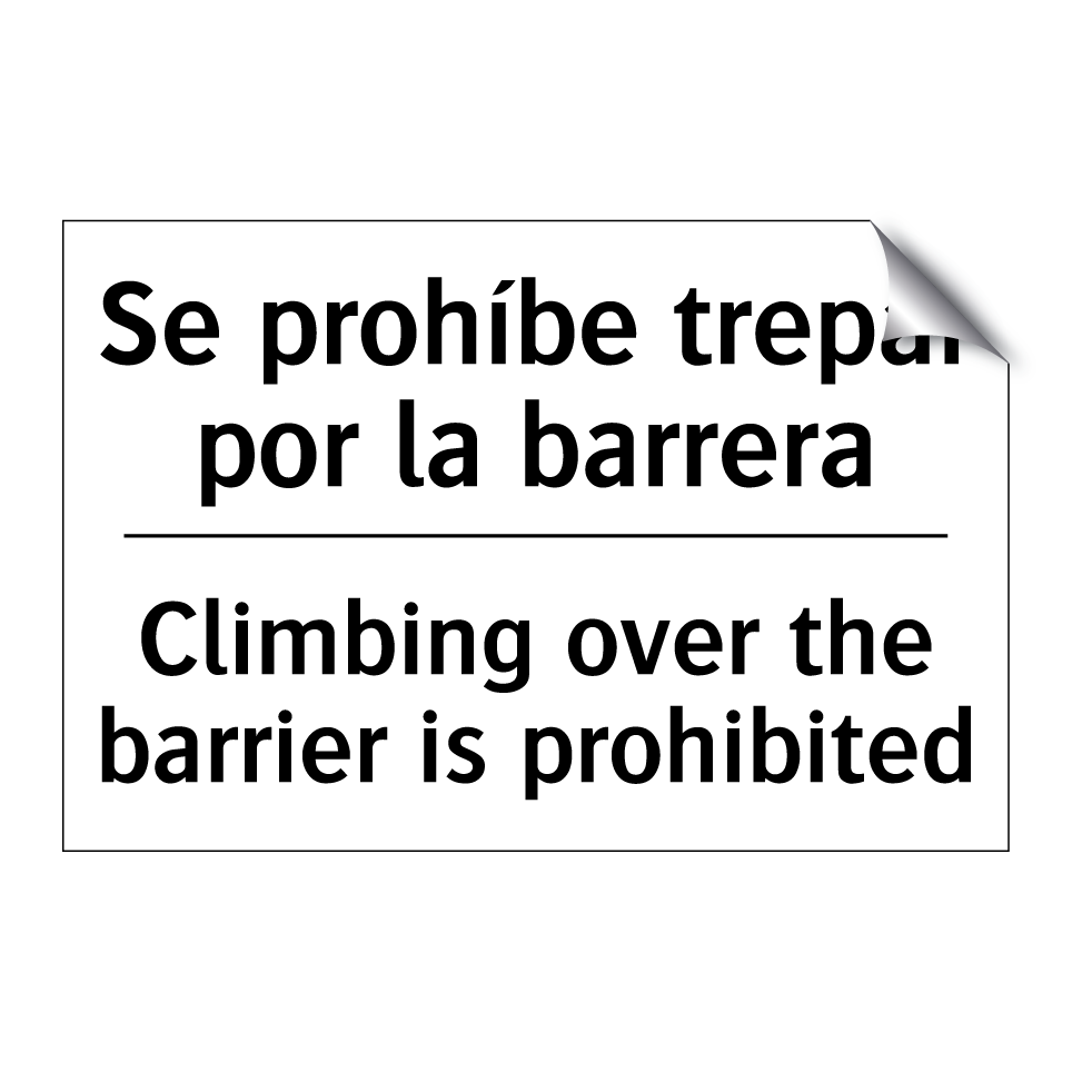 Se prohíbe trepar por la barrera - Climbing over the barrier is prohibited