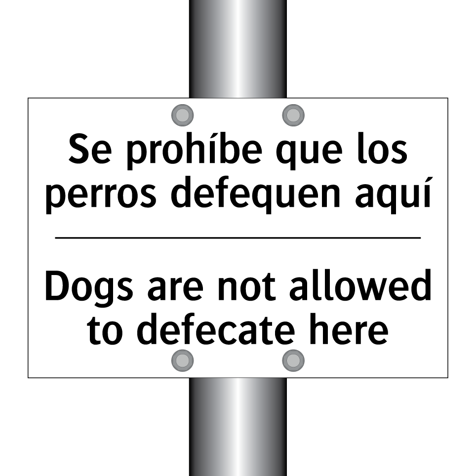 Se prohíbe que los perros defequen aquí - Dogs are not allowed to defecate here