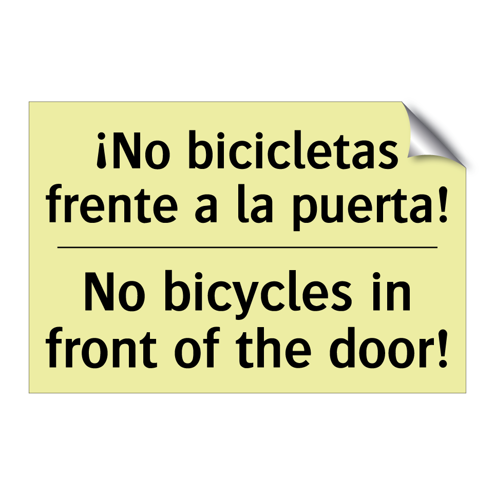 ¡No bicicletas frente a la puerta! - No bicycles in front of the door!