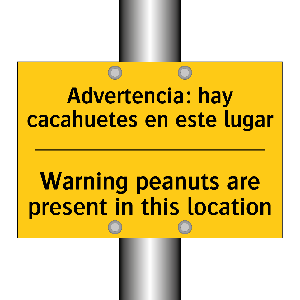 Advertencia: hay cacahuetes en este lugar - Warning peanuts are present in this location