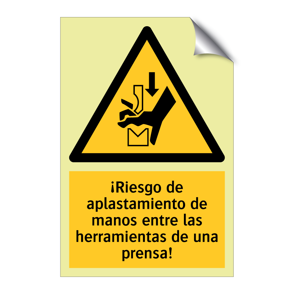¡Riesgo de aplastamiento de manos entre las herramientas de una prensa!