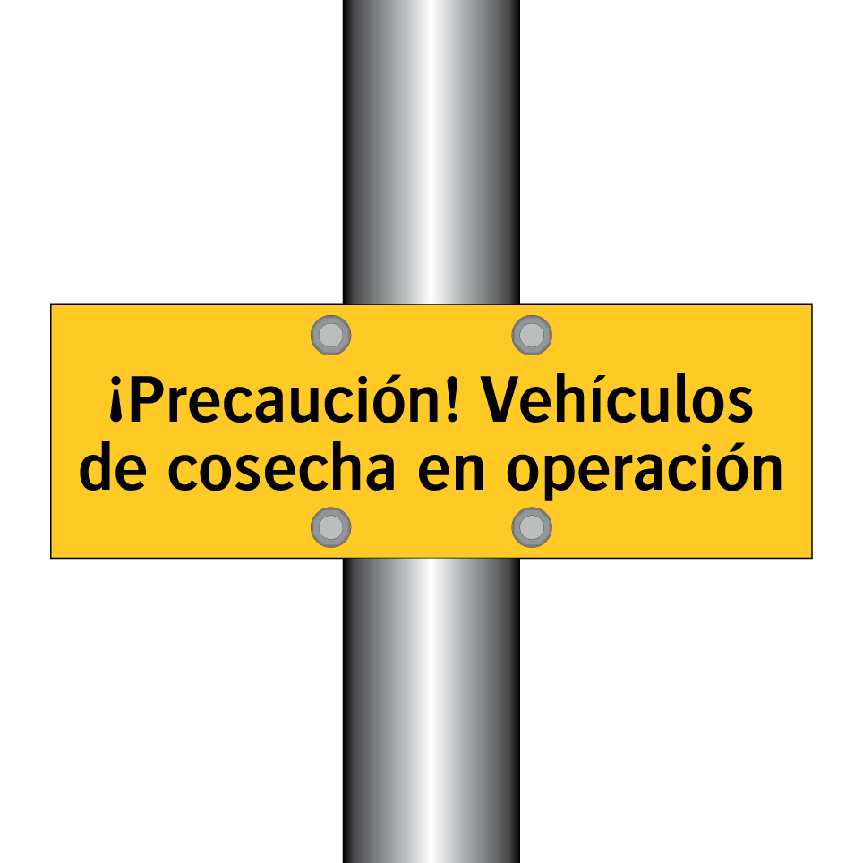 ¡Precaución! Vehículos de cosecha en operación